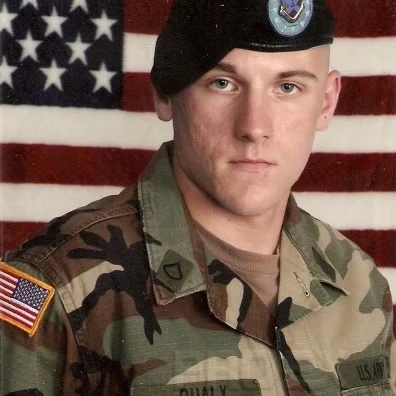 Andrew Qualy in U.S. Army uniform during his military service
